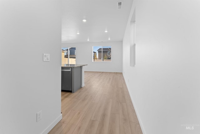 690 N Tessa Ave, Meridian, ID 83642 - hall featuring baseboards, light wood-style floors, and recessed lighting