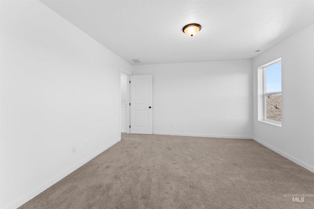 690 N Tessa Ave, Meridian, ID 83642 - unfurnished room featuring carpet floors and baseboards