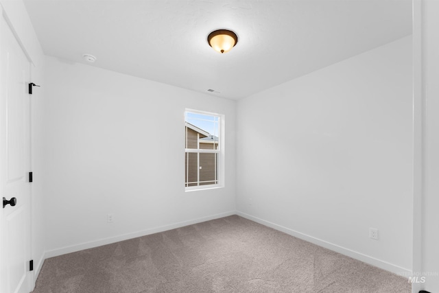 690 N Tessa Ave, Meridian, ID 83642 - empty room with carpet, baseboards, and a smoke detector