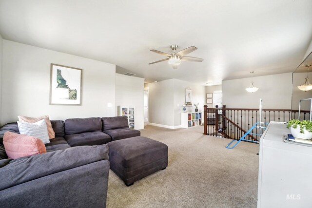 2858 Sunray Loop, Twin Falls, ID 83301 - carpeted living area featuring ceiling fan and baseboards