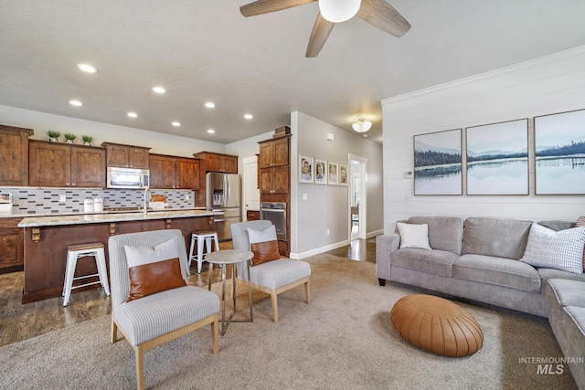 2858 Sunray Loop, Twin Falls, ID 83301 - living area featuring recessed lighting, baseboards, ceiling fan, and light colored carpet