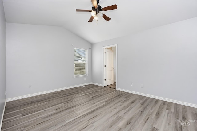 1030 Caswell Ave W, Twin Falls, ID 83301 - unfurnished bedroom with wood finished floors, lofted ceiling, and a ceiling fan