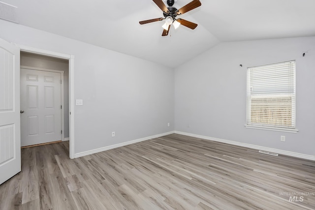1030 Caswell Ave W, Twin Falls, ID 83301 - empty room featuring lofted ceiling, light wood-style flooring, and ceiling fan