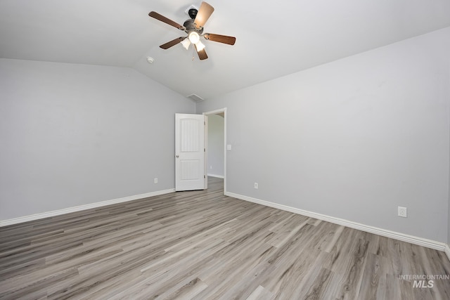 1030 Caswell Ave W, Twin Falls, ID 83301 - empty room with wood finished floors, a ceiling fan, lofted ceiling, and a smoke detector