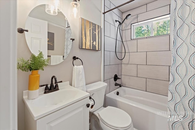full bathroom with toilet, shower / tub combo, and vanity