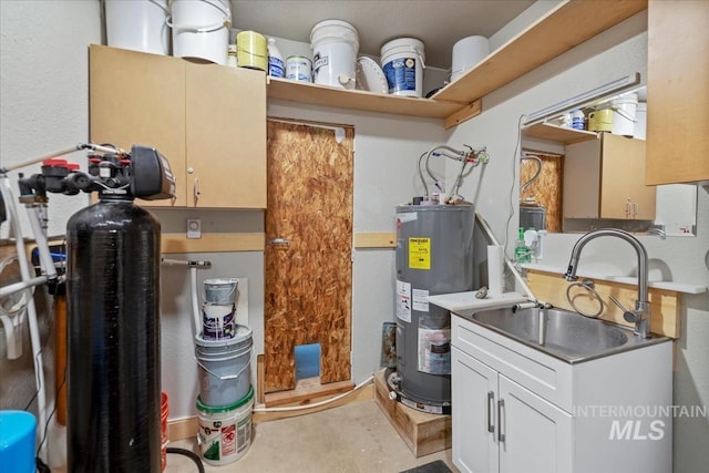 utility room featuring water heater and a sink