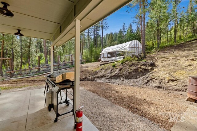 view of patio with fence