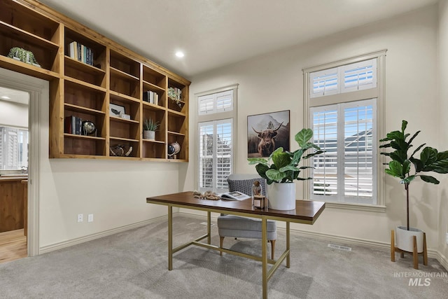 carpeted home office with recessed lighting, visible vents, and baseboards