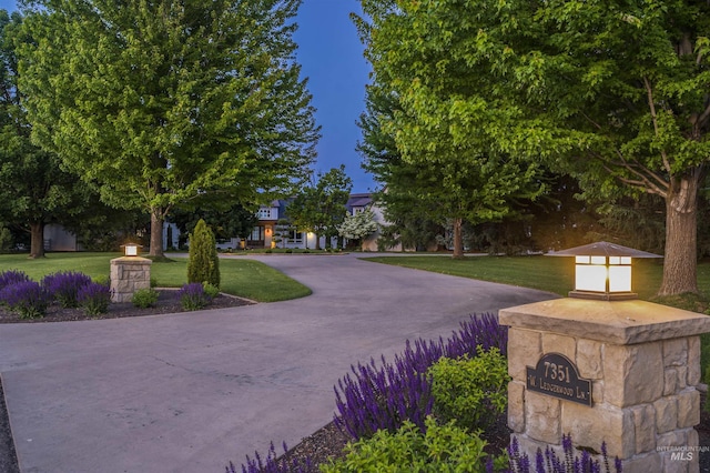 view of front of home with a front lawn