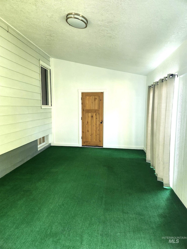 205 Nebraska, Gooding, ID 83330 - empty room featuring a textured ceiling and dark carpet