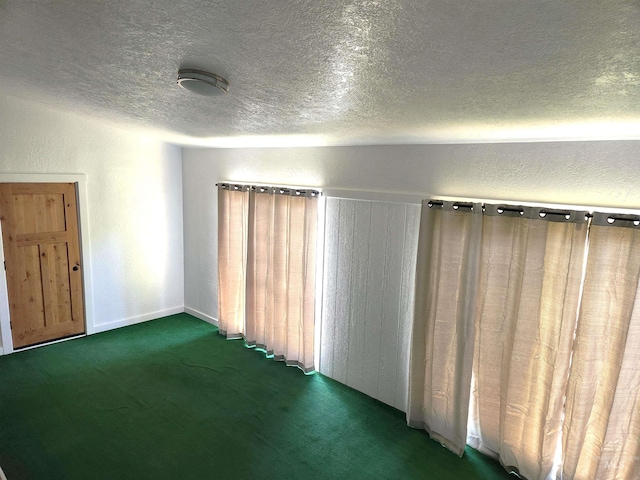 205 Nebraska, Gooding, ID 83330 - carpeted spare room featuring a textured ceiling