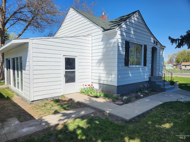 205 Nebraska, Gooding, ID 83330 - view of property exterior with roof with shingles