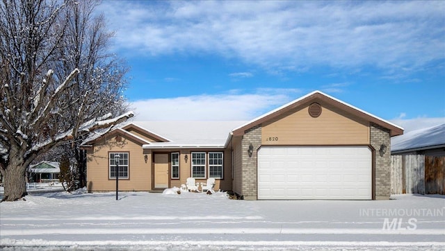 single story home with a garage