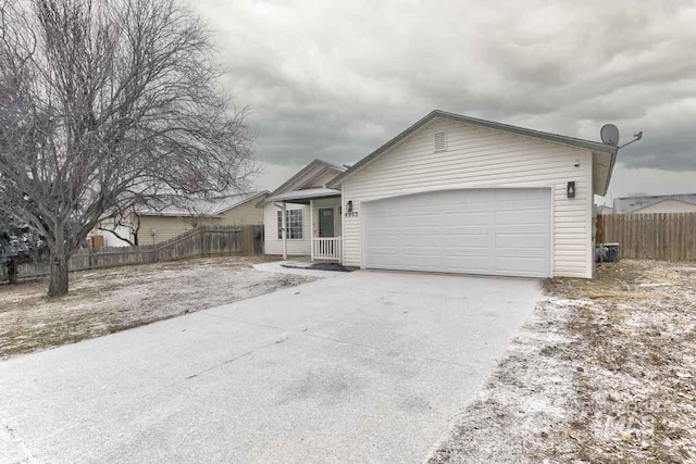 view of front of property featuring a garage