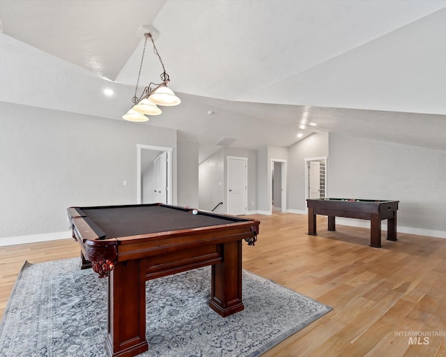 rec room featuring vaulted ceiling, pool table, and light hardwood / wood-style floors