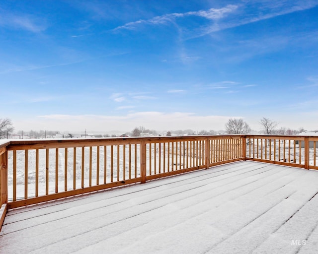 view of snow covered deck