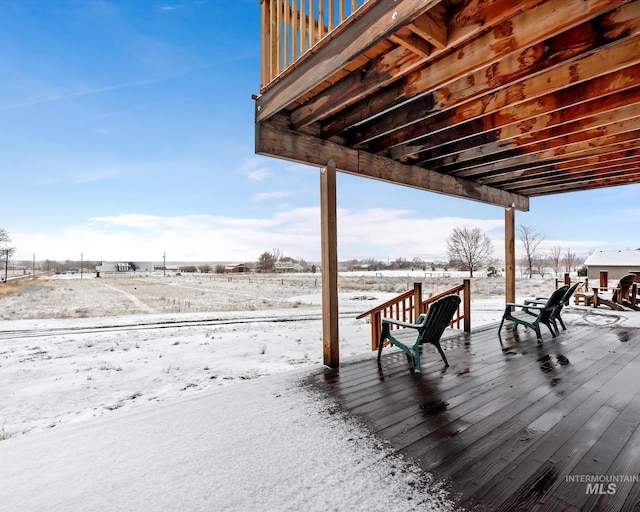 view of snow covered deck