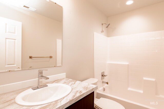 bathroom with shower / bathing tub combination, vanity, toilet, visible vents, and recessed lighting