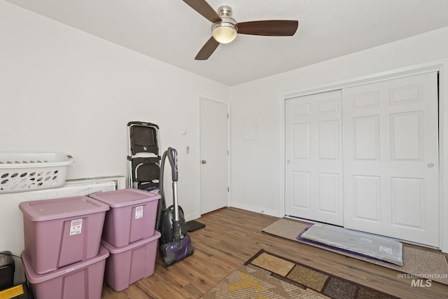 miscellaneous room featuring hardwood / wood-style flooring and ceiling fan