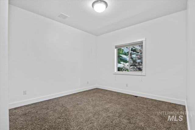 356 E Lake Briar Ln, Eagle, ID 83616 - empty room featuring dark colored carpet and baseboards