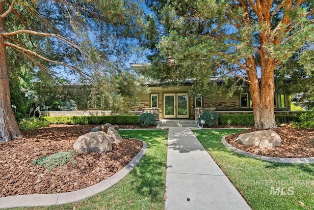 356 E Lake Briar Ln, Eagle, ID 83616 - obstructed view of property with a front lawn and stone siding