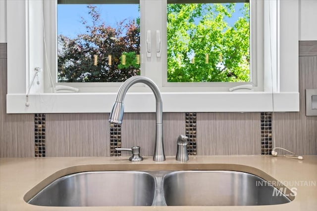 356 E Lake Briar Ln, Eagle, ID 83616 - kitchen view of a sink and tasteful backsplash
