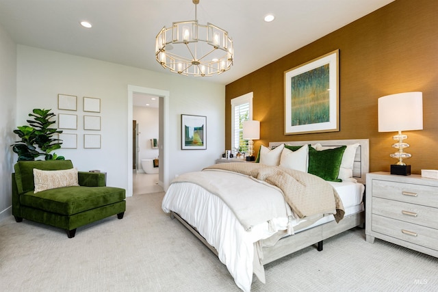 bedroom with a chandelier, light carpet, recessed lighting, and connected bathroom