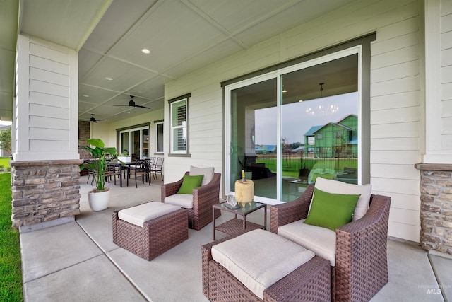 view of patio with ceiling fan and outdoor dining area