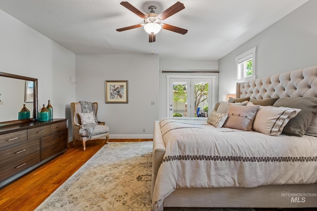 2411 S Marypost, Eagle, ID 83616 - bedroom with access to outside, wood finished floors, and a ceiling fan