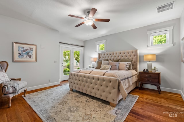 2411 S Marypost, Eagle, ID 83616 - bedroom featuring access to outside, wood finished floors, and a ceiling fan