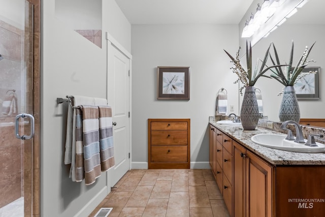 2411 S Marypost, Eagle, ID 83616 - bathroom featuring double vanity, a shower stall, and tile patterned flooring