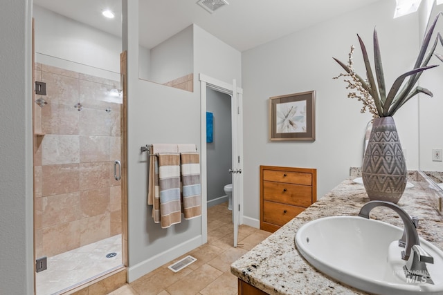2411 S Marypost, Eagle, ID 83616 - full bath featuring a shower stall, double vanity, tile patterned flooring, and recessed lighting
