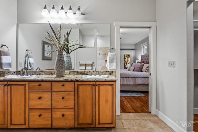 2411 S Marypost, Eagle, ID 83616 - ensuite bathroom with double vanity and tile patterned floors