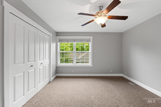 2411 S Marypost, Eagle, ID 83616 - unfurnished bedroom featuring carpet flooring, a closet, and ceiling fan