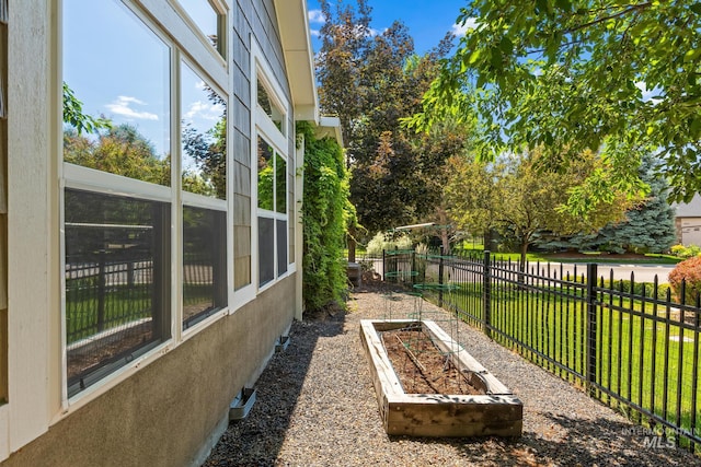 2411 S Marypost, Eagle, ID 83616 - view of yard featuring a garden