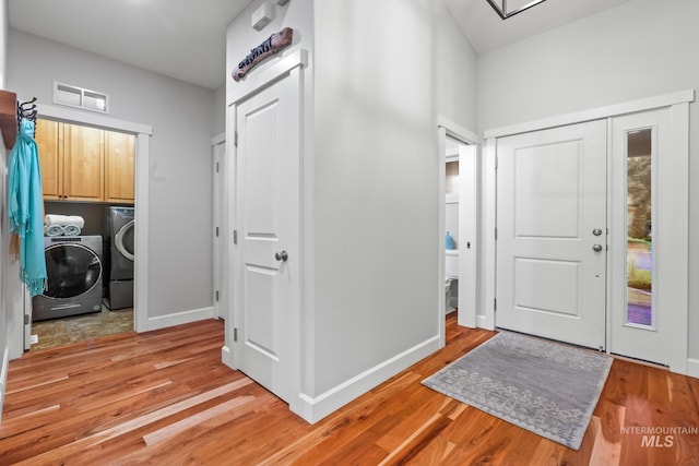 2411 S Marypost, Eagle, ID 83616 - foyer entrance with washer and dryer and light wood finished floors