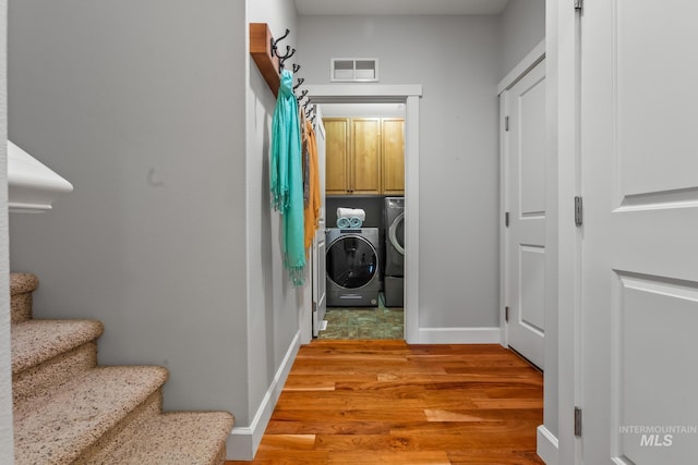 2411 S Marypost, Eagle, ID 83616 - laundry room featuring independent washer and dryer and light wood-style floors