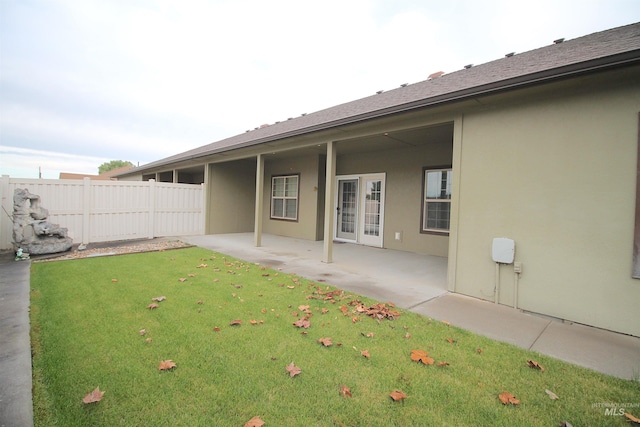 back of property featuring stucco siding and a patio area