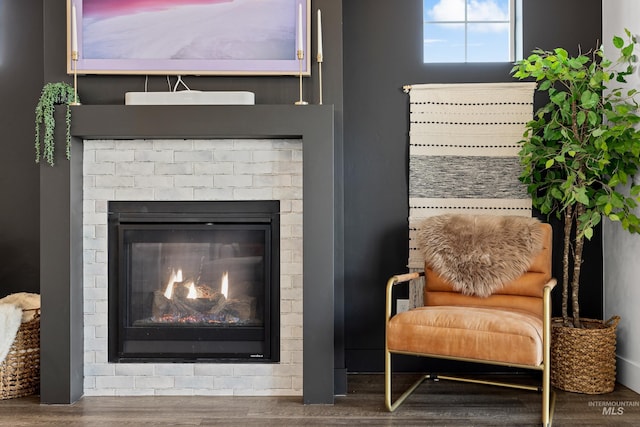 10148 Irongate Dr, Nampa, ID 83687 - interior details featuring wood finished floors and a brick fireplace