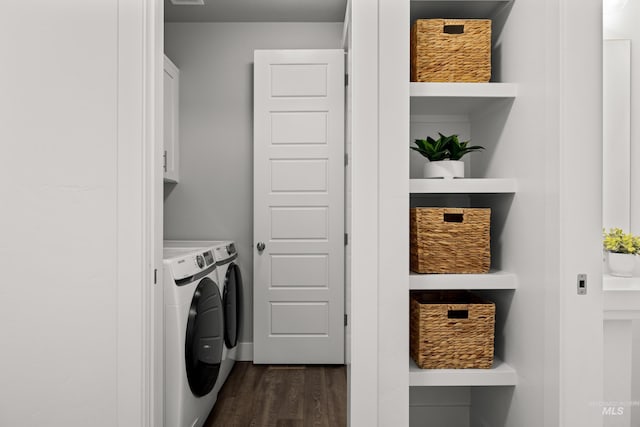 10148 Irongate Dr, Nampa, ID 83687 - laundry area featuring separate washer and dryer, cabinet space, and dark wood-type flooring
