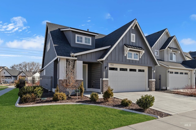 10148 Irongate Dr, Nampa, ID 83687 - craftsman-style house featuring a front lawn, driveway, roof with shingles, and board and batten siding