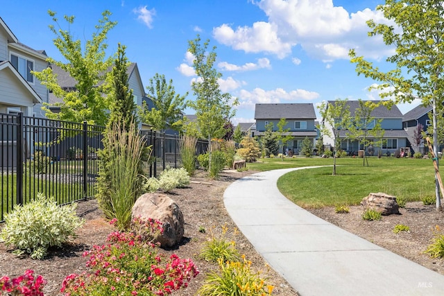10148 Irongate Dr, Nampa, ID 83687 - view of community featuring a yard, a residential view, and fence
