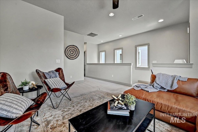 2128 N Woodcreek St, Boise, ID 83704 - carpeted living area with baseboards and recessed lighting