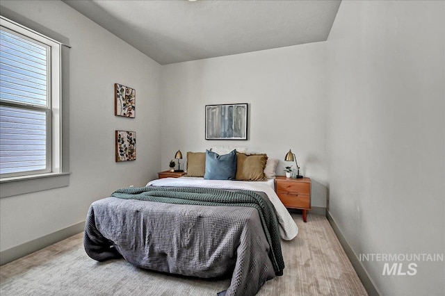 2128 N Woodcreek St, Boise, ID 83704 - bedroom with light colored carpet and baseboards