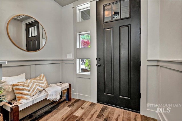 2128 N Woodcreek St, Boise, ID 83704 - entrance foyer with a decorative wall, wood finished floors, and a wainscoted wall