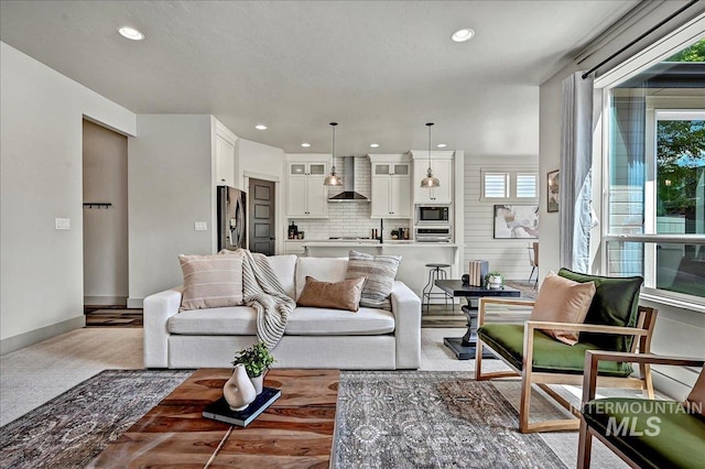 2128 N Woodcreek St, Boise, ID 83704 - living area featuring healthy amount of natural light, recessed lighting, and baseboards