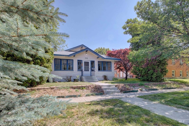 412 6th Ave N, Twin Falls, ID 83301 - bungalow-style home with a front yard