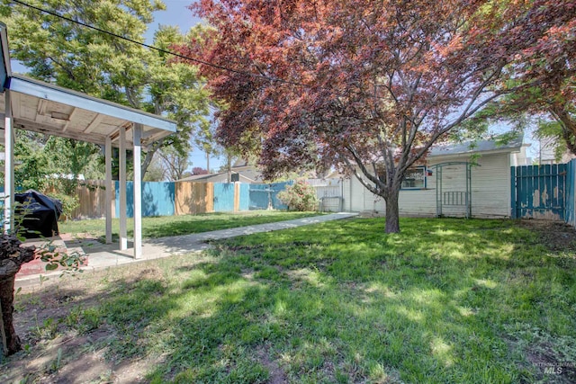 412 6th Ave N, Twin Falls, ID 83301 - fenced backyard with a patio