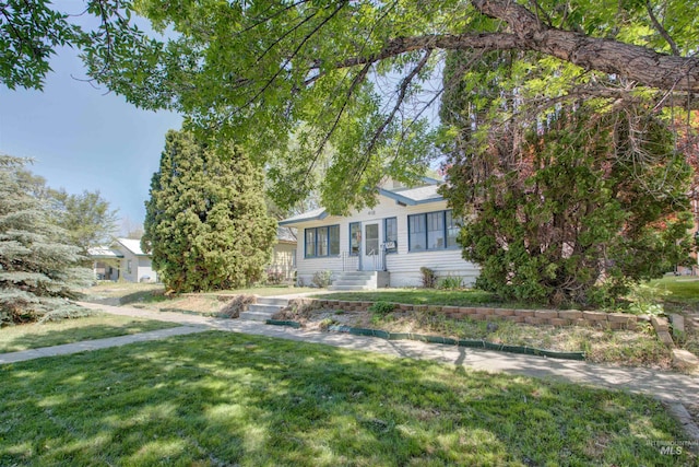412 6th Ave N, Twin Falls, ID 83301 - view of front facade with a front lawn