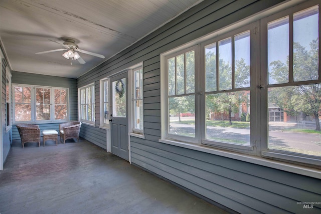 412 6th Ave N, Twin Falls, ID 83301 - sunroom / solarium with a ceiling fan, wood finished floors, and wooden walls